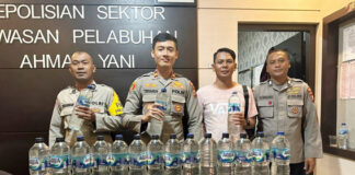 Polsek Pelabuhan Ahmad Yani Ternate Amankan Puluhan Botol Miras Jenis Cap Tikus